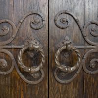 One of the many old wooden doors at the washington national cathedral.